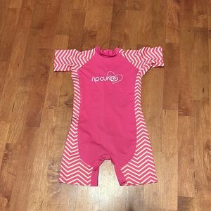 Ripcurl short sleeved sun suit. Size 3 girls .